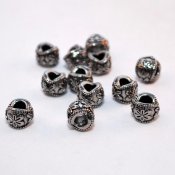 Rostfritt stål - mönstrad pärla med stort hål
