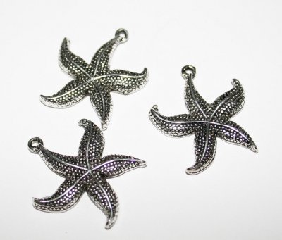 Antiksilverfärgade berlocker - sjöstjärnor, 4 st